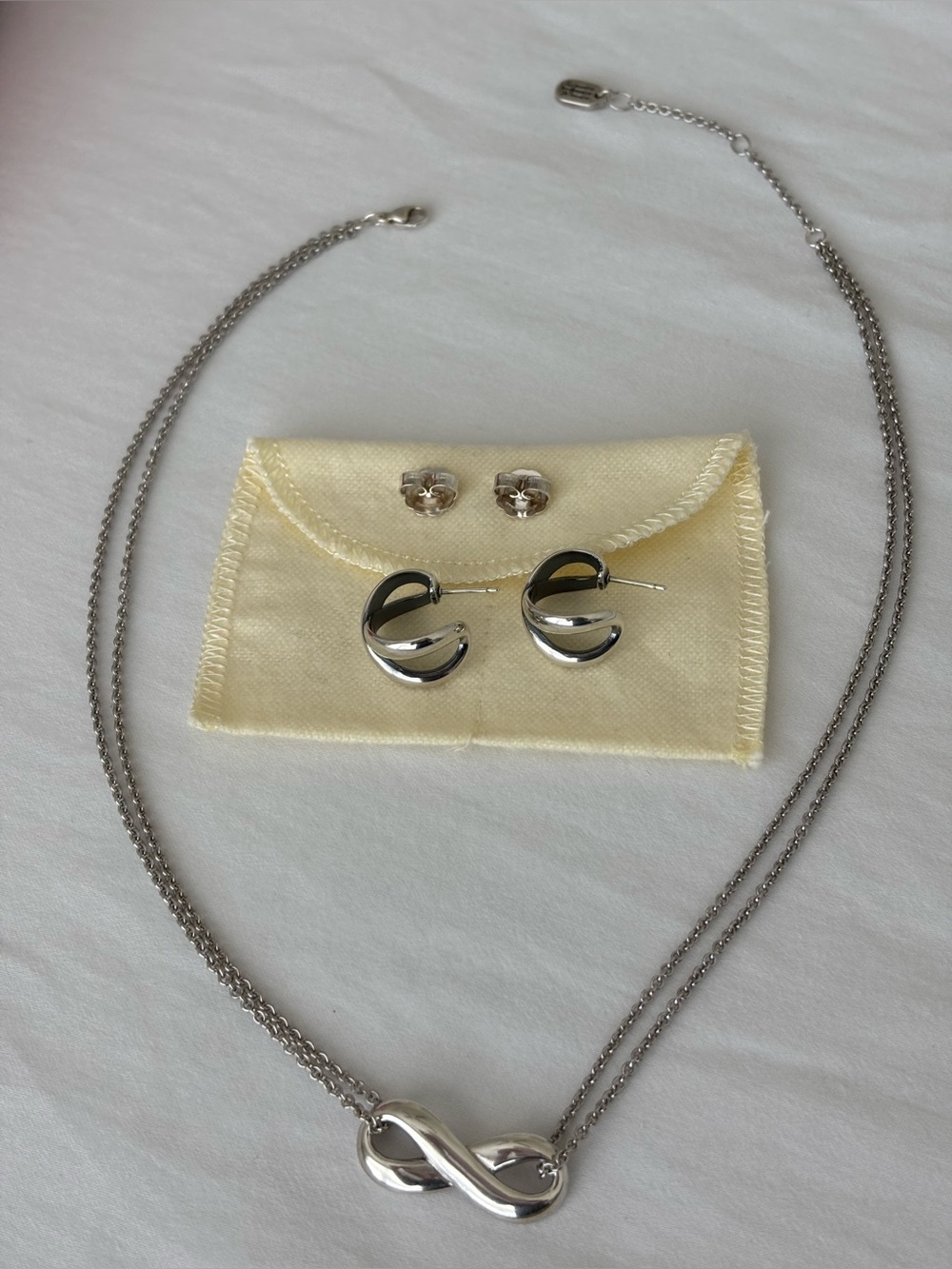 Rare and retired James Avery 
Infinity Necklace and Hoop Earrings Set